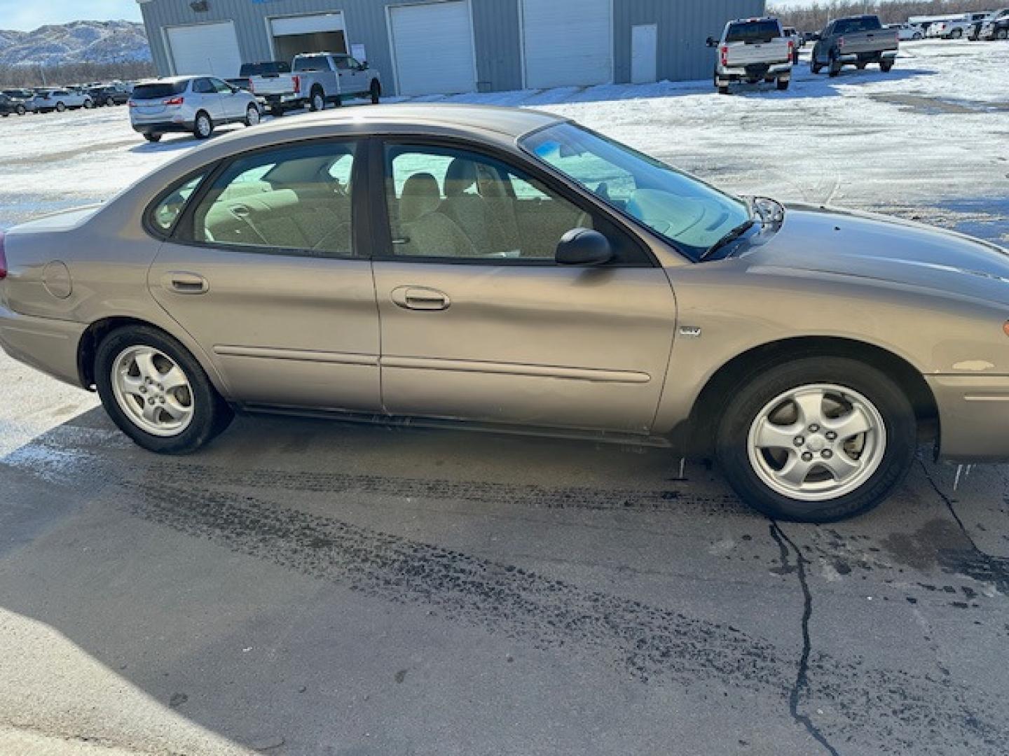 2004 Gold /Beige Ford Taurus (1FAFP55S74G) , Automatic transmission, located at 3200 1st Avenue North, Billings, MT, 59101, (406) 245-9055, 45.779270, -108.510742 - Low Mileage Local Trade-In. Well Maintained, Power Seat, Power Windows, Power Door Locks, Tilt Steering, Duratec Engine and Much More! CarFax Dealer. Auto Brokers of Montana/AA&A Auto Rental/Fox Car Rental Billings - Photo#4